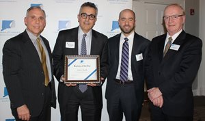 Dime Bank President & CEO Nick Caplanson accepts the Chamber ECT Business of the Year award